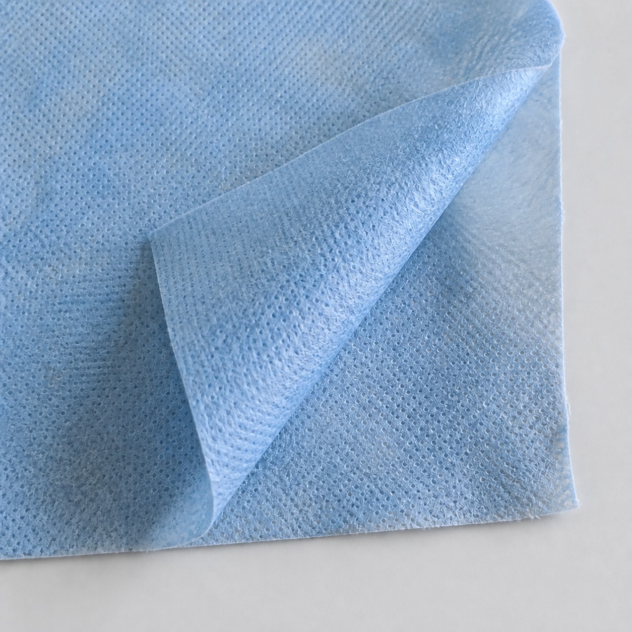 Nonwoven roll goods in a clean converting facility